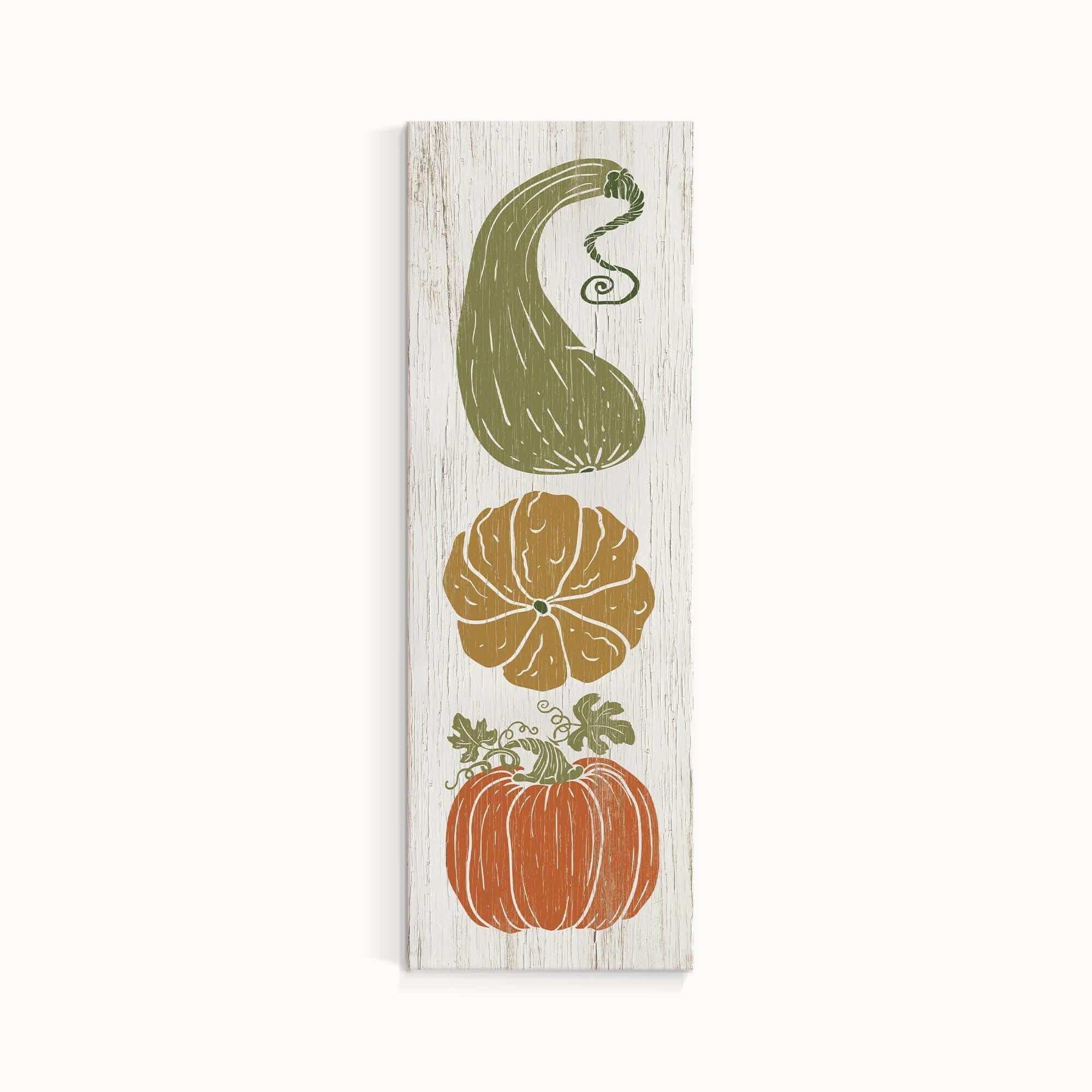 a wooden sign with three different vegetables on it