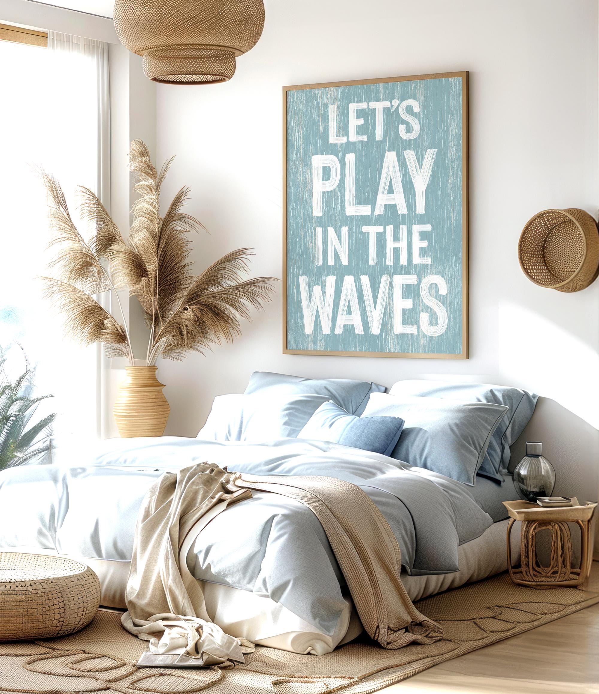 a bedroom with a large bed and a poster on the wall