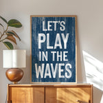 a blue sign that says let&#39;s play in the waves