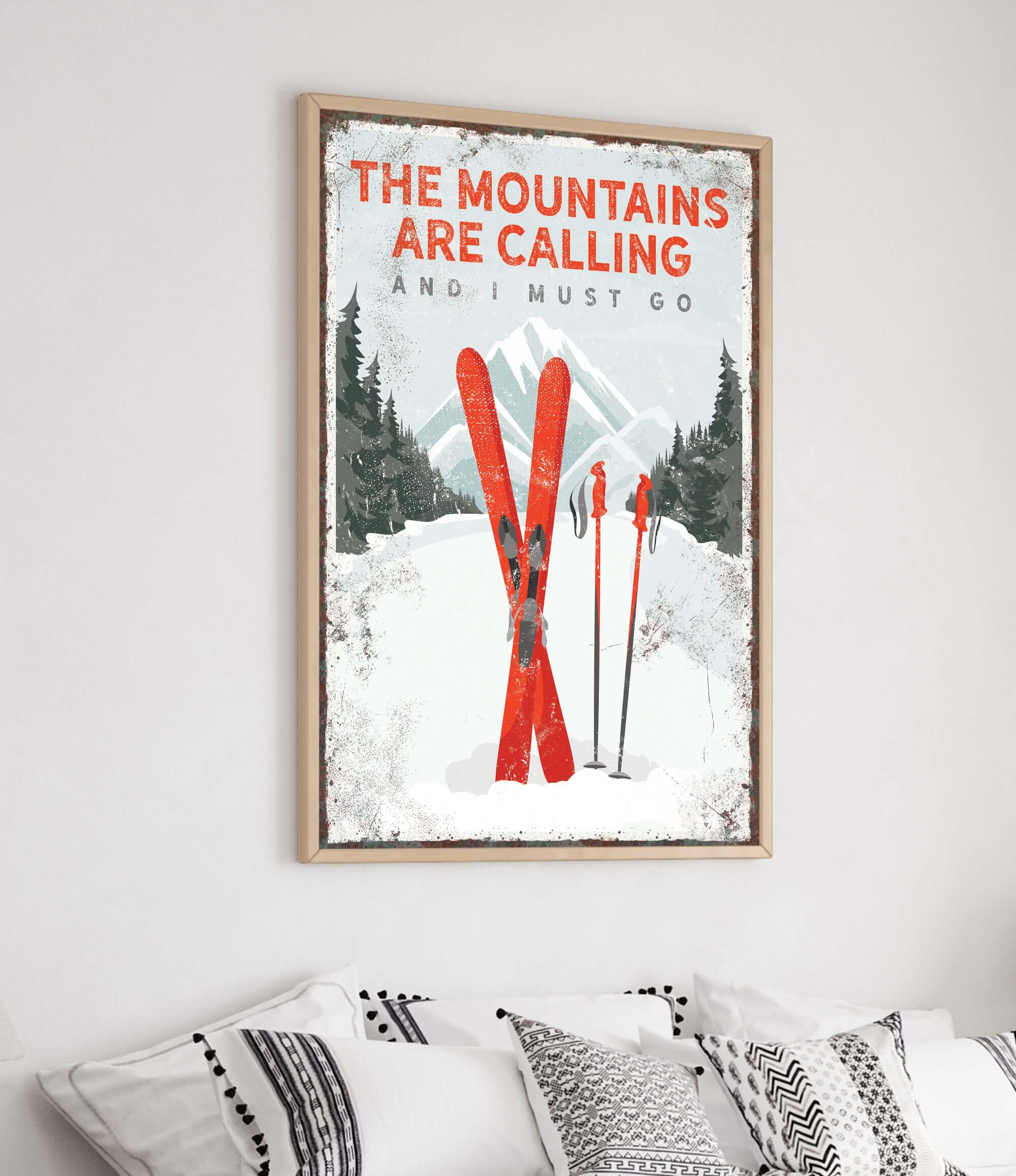 a poster of skis on a wall above a bed