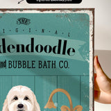 a hand holding a sign with a picture of a dog