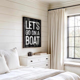 a bedroom with a bed, dresser and window