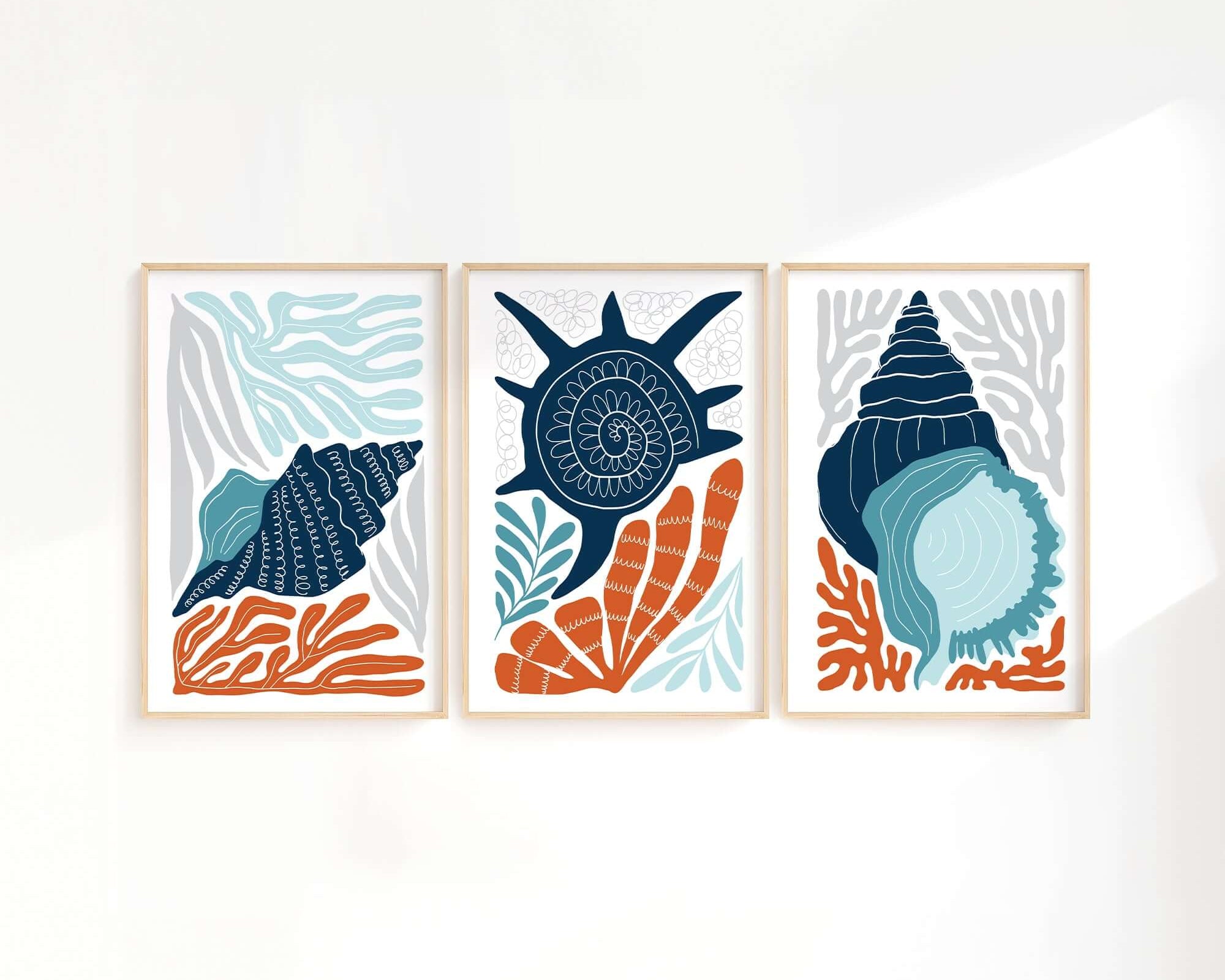 The Ocean Blocks Triptych | Set of Three Prints | 328 showcases abstract blue seashells and orange coral, ideal as wall art to enhance your stylish home decor.
