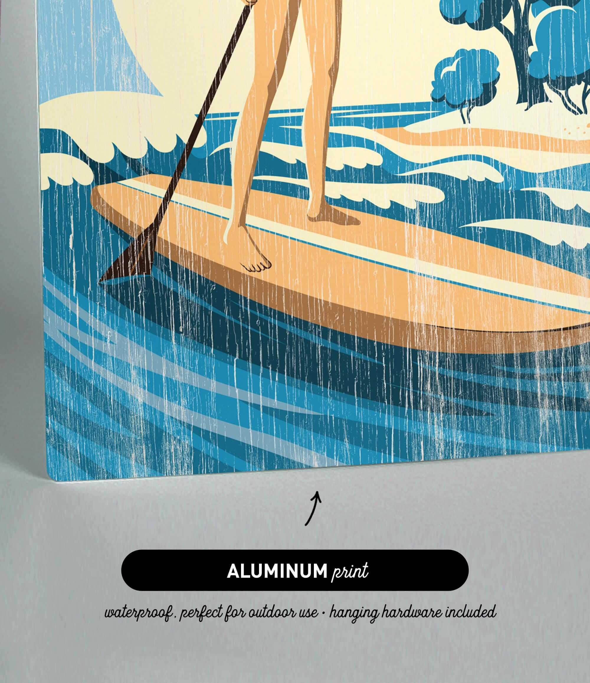 The image is an illustration of a woman paddleboarding on a body of water, with a text overlay that reads "ALUMINUM print" and "waterproof, perfect for outdoor use - hanging hardware included".