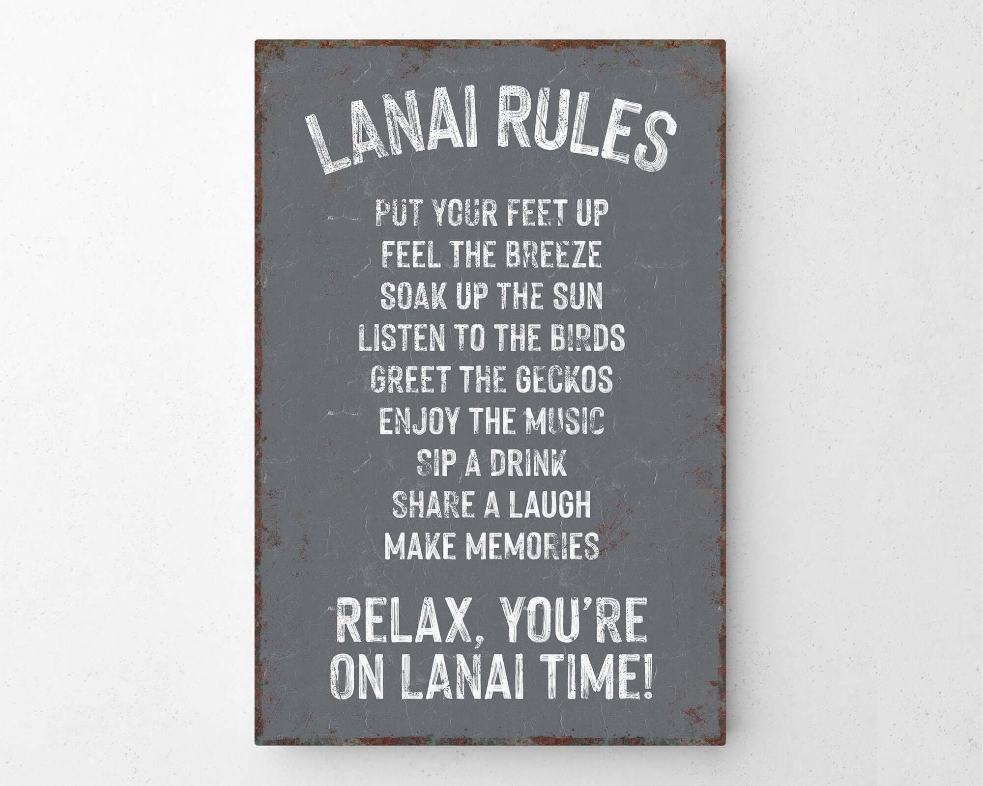 a sign that says lanai rules put your feet up feel the breeze break of