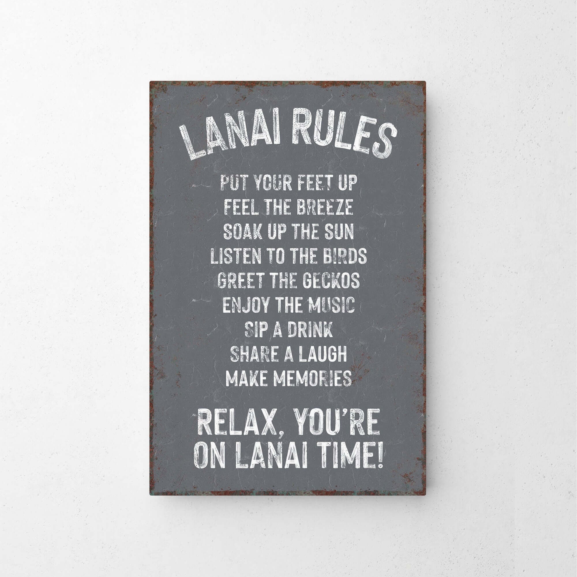 a sign that says lanai rules put your feet up feel the breeze break of