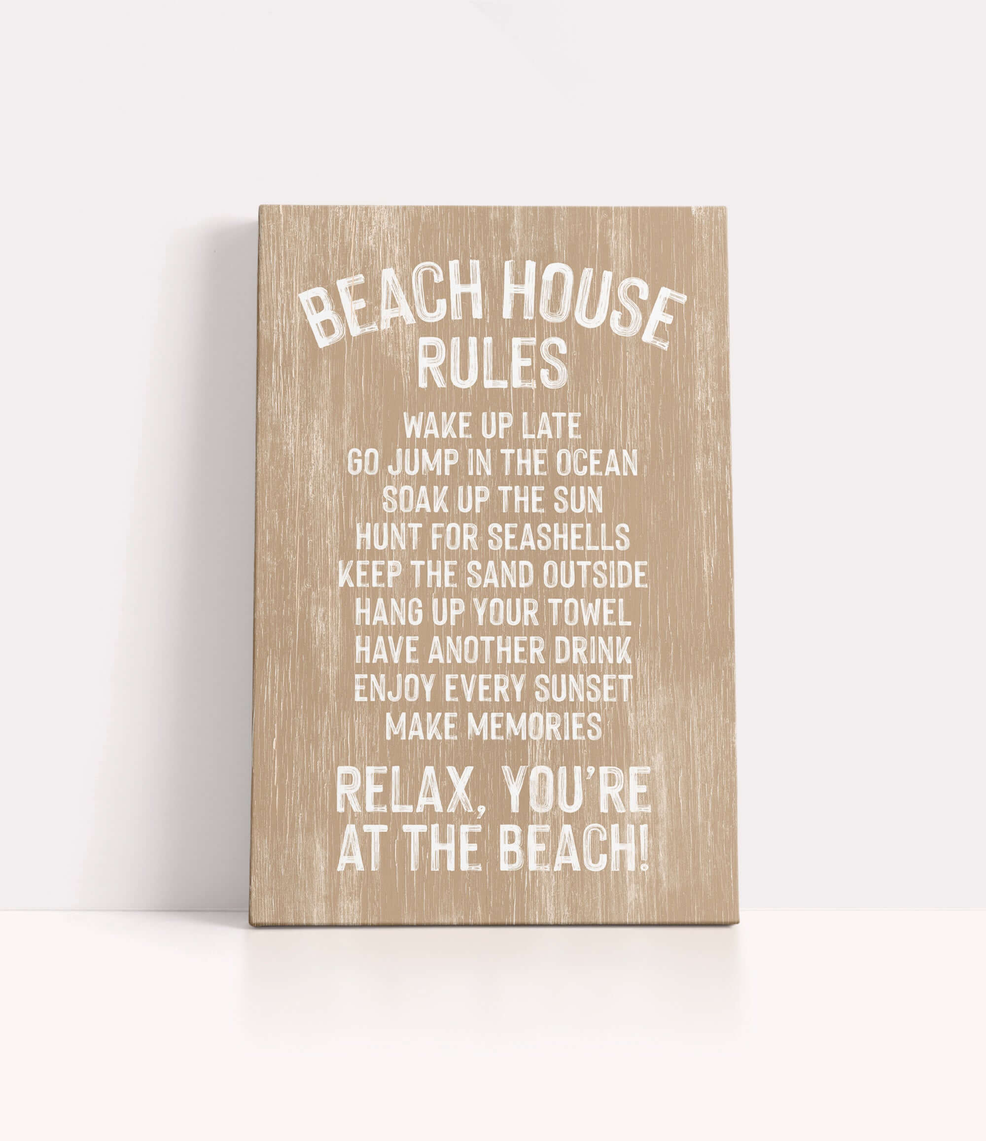 a wooden sign with white text that provides beach house rules, including guidelines for guests to follow while at the beach.