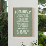 a picture of a pool rules sign on a wall