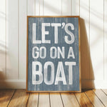 a wooden sign that says let&#39;s go on a boat