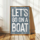 a wooden sign that says let&#39;s go on a boat