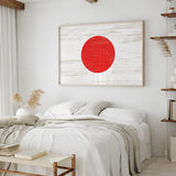 a white bedroom with a red circle on the wall