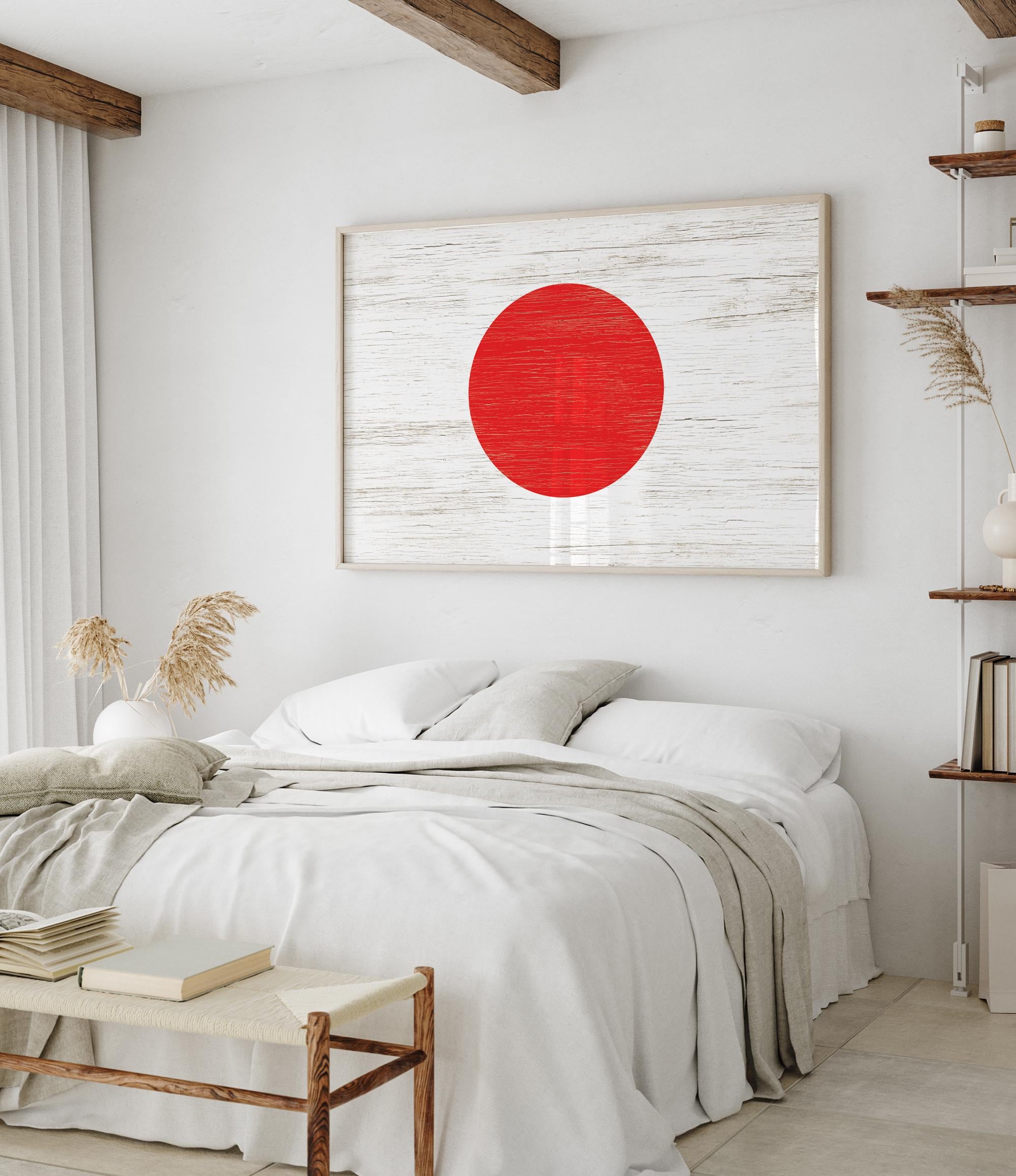 a white bedroom with a red circle on the wall