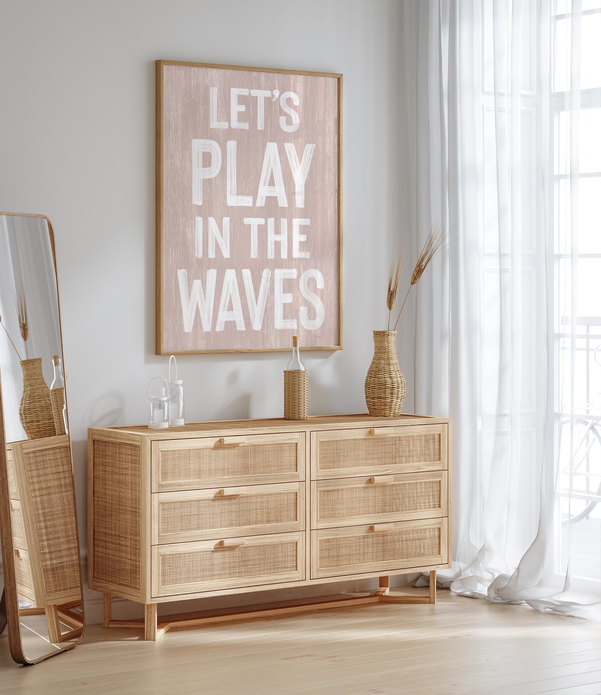 a wooden dresser sitting next to a window