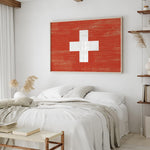 a bedroom with a bed and a painting on the wall