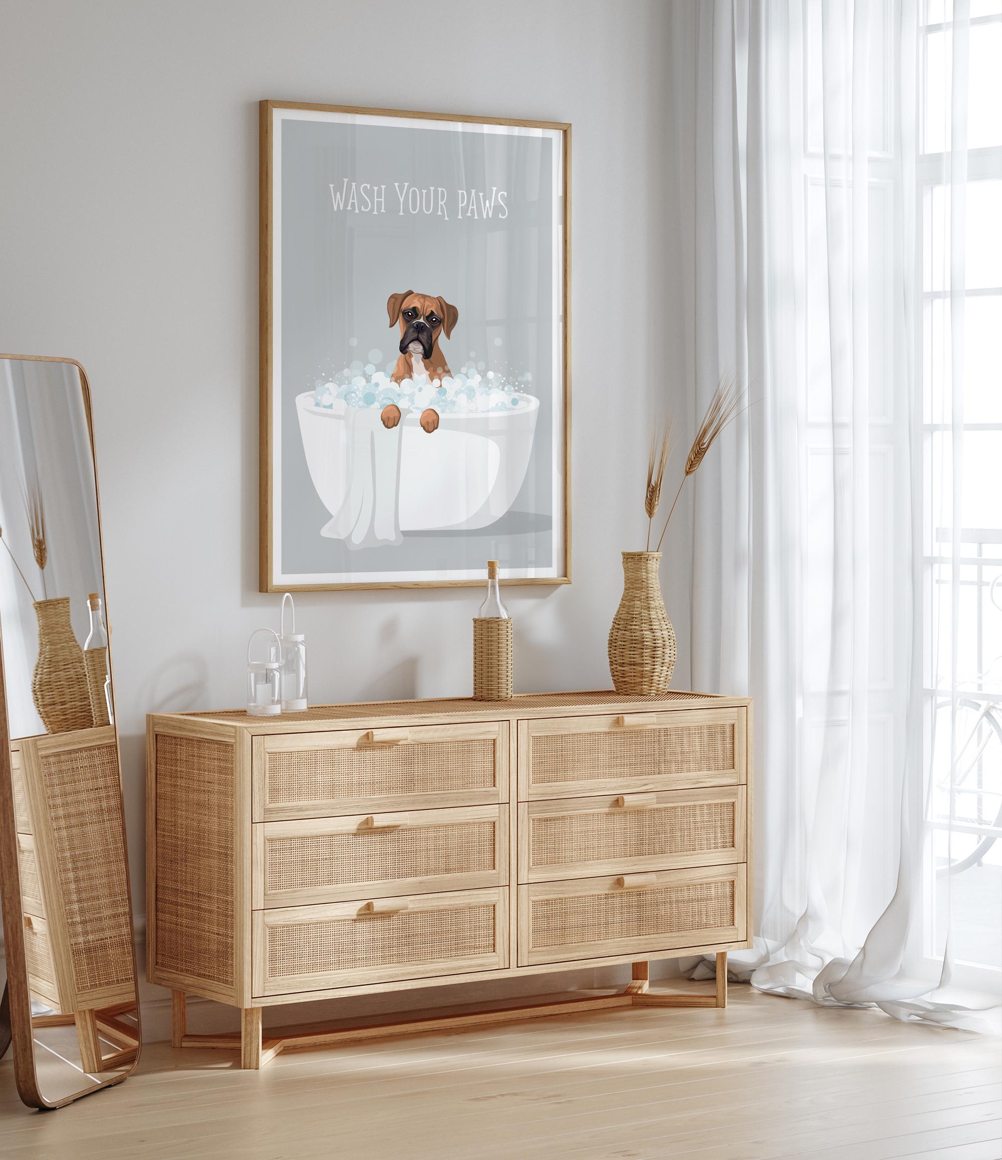 a wooden dresser with a framed poster of a dog sitting in a bathtub, accompanied by the text "WASH YOUR PAWS". The dresser is situated in a room with a mirror and a window, creating a cozy and stylish atmosphere.