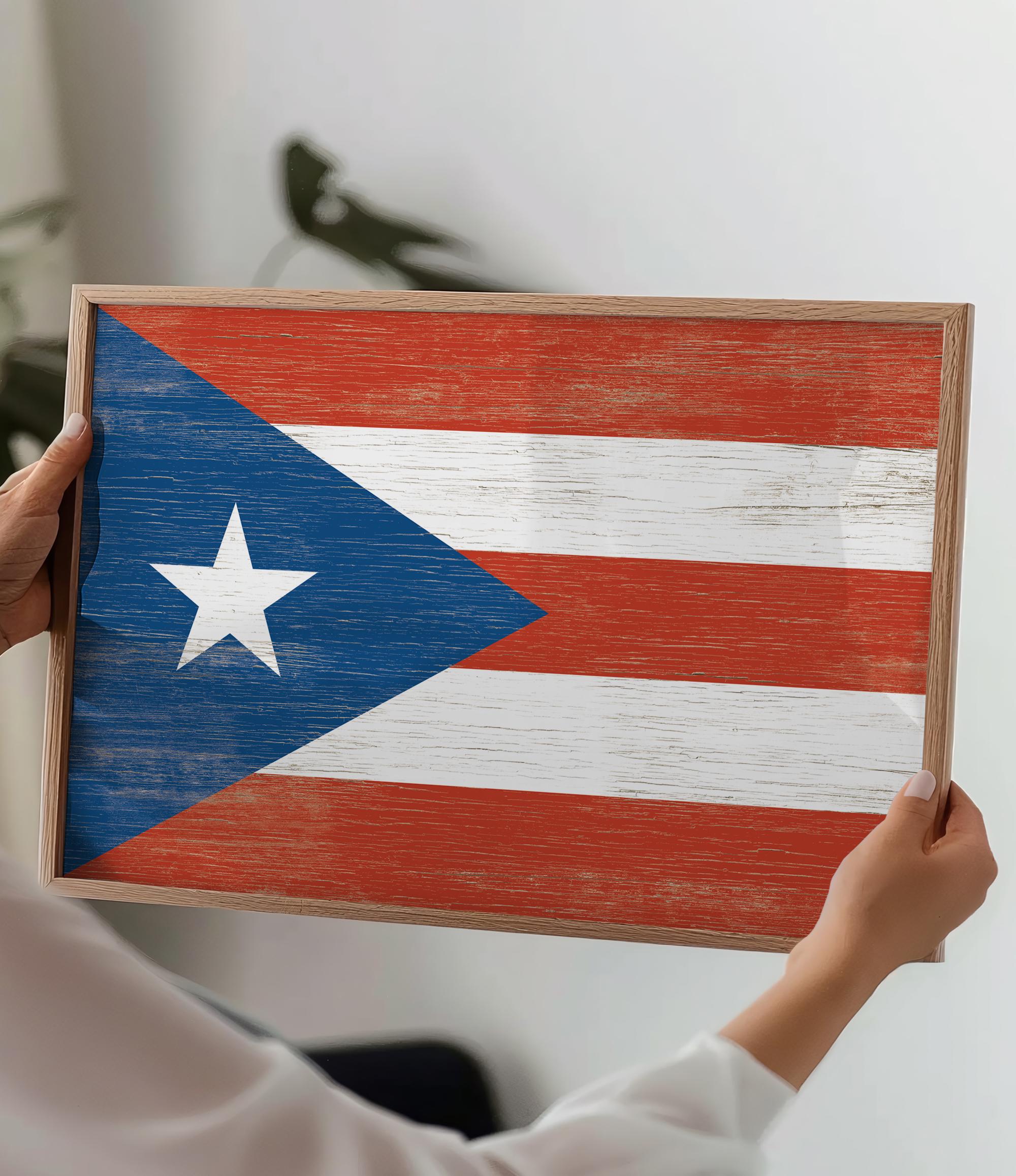 a person holding a wooden sign with a flag painted on it
