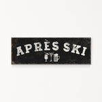 A black and white sign with the text "APRÈS SKI" in large letters.