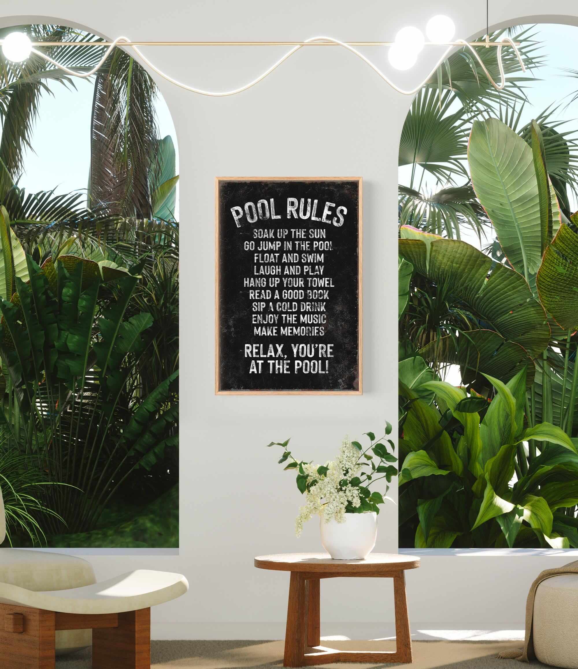 a room with a potted plant and a sign on the wall