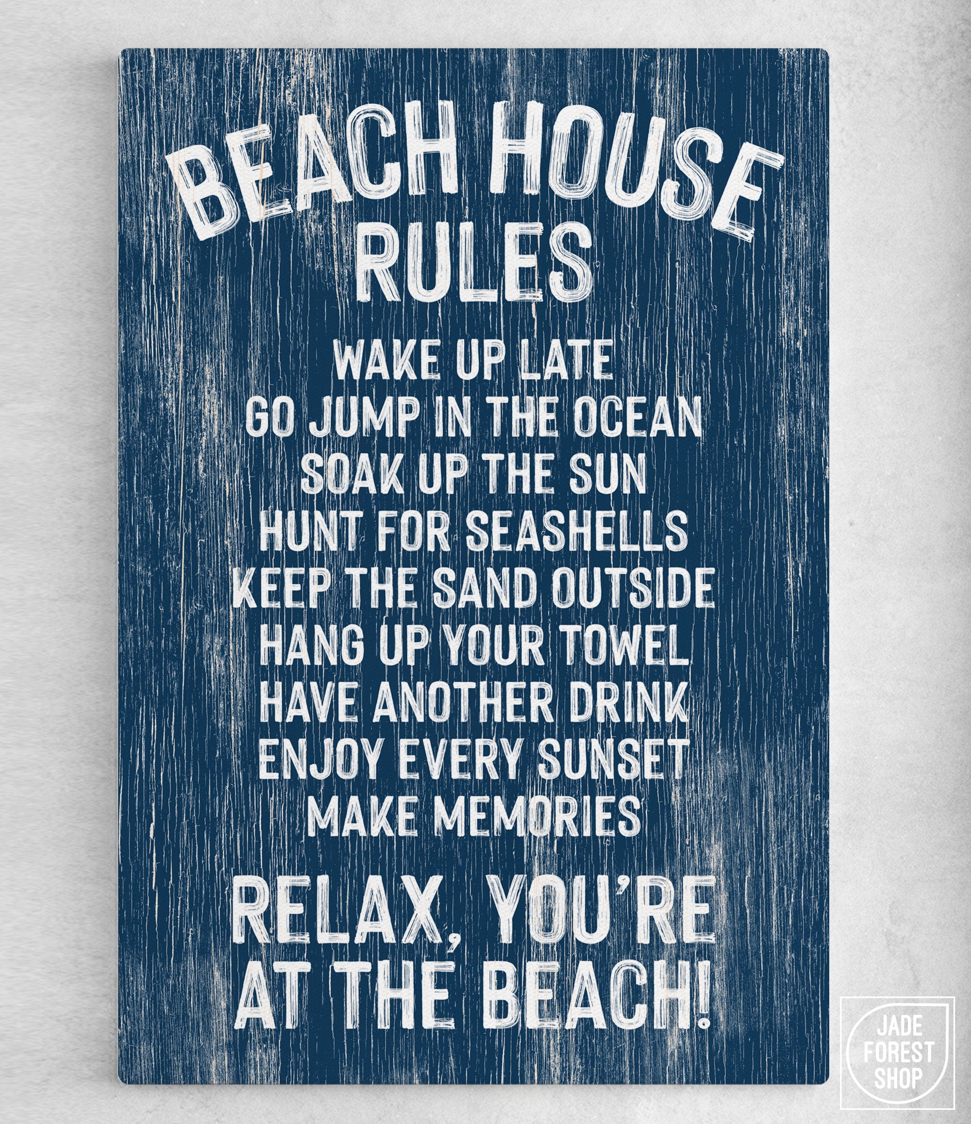 Beach House Rules Sign, Painted Wood, Nautical—this blue sign features white text with fun "Beach House Rules" ending in "Relax, you're at the beach!" for a charming coastal wall art accent.