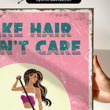 The image is a poster with a woman in a pink bikini holding a surfboard. The text on the poster says "Make hair care" and "Don't care".