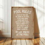 a picture of a pool rules sign on a wooden floor