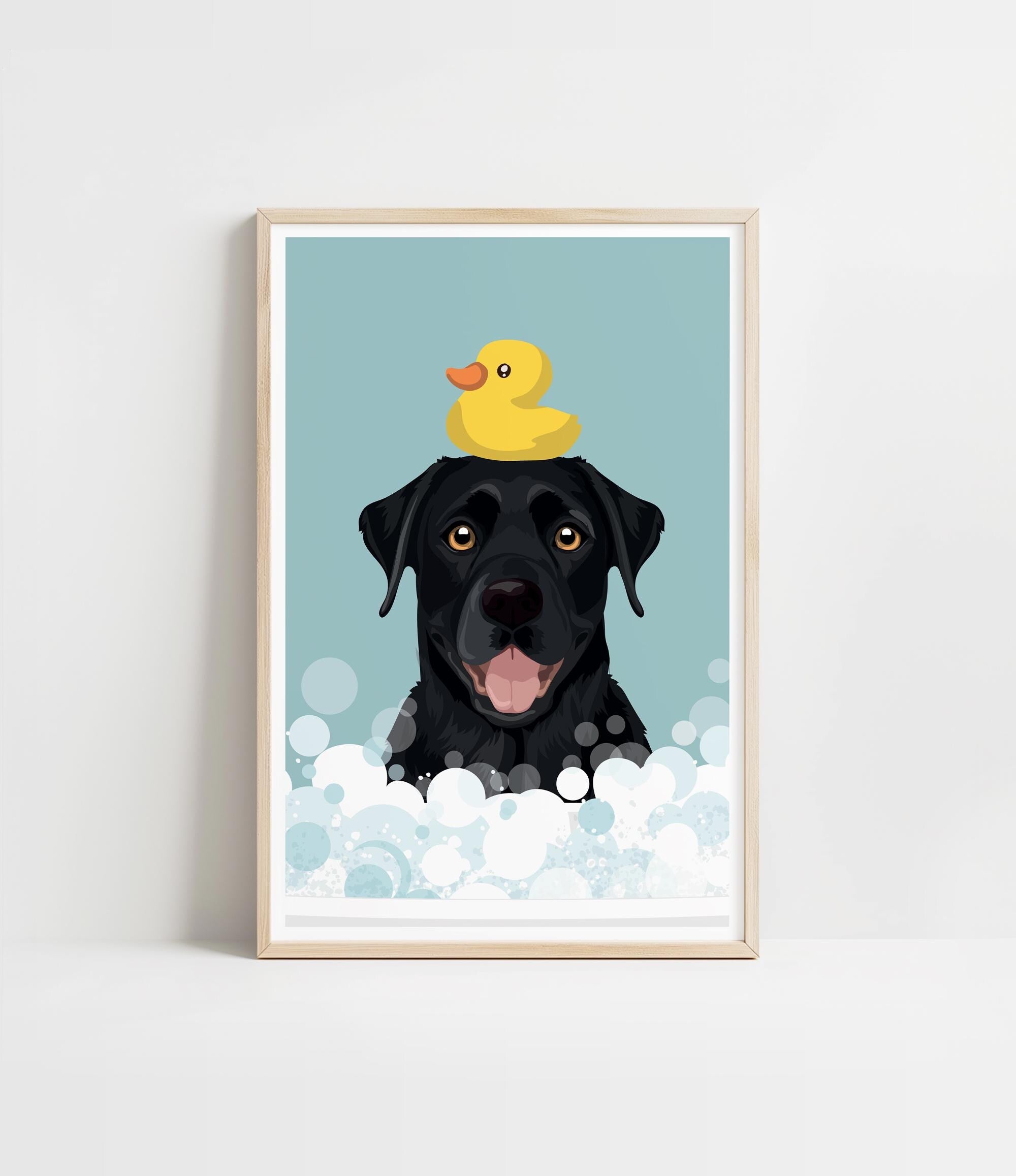 A black dog with a yellow rubber duck sitting on its head, surrounded by bubbles, in a framed print.