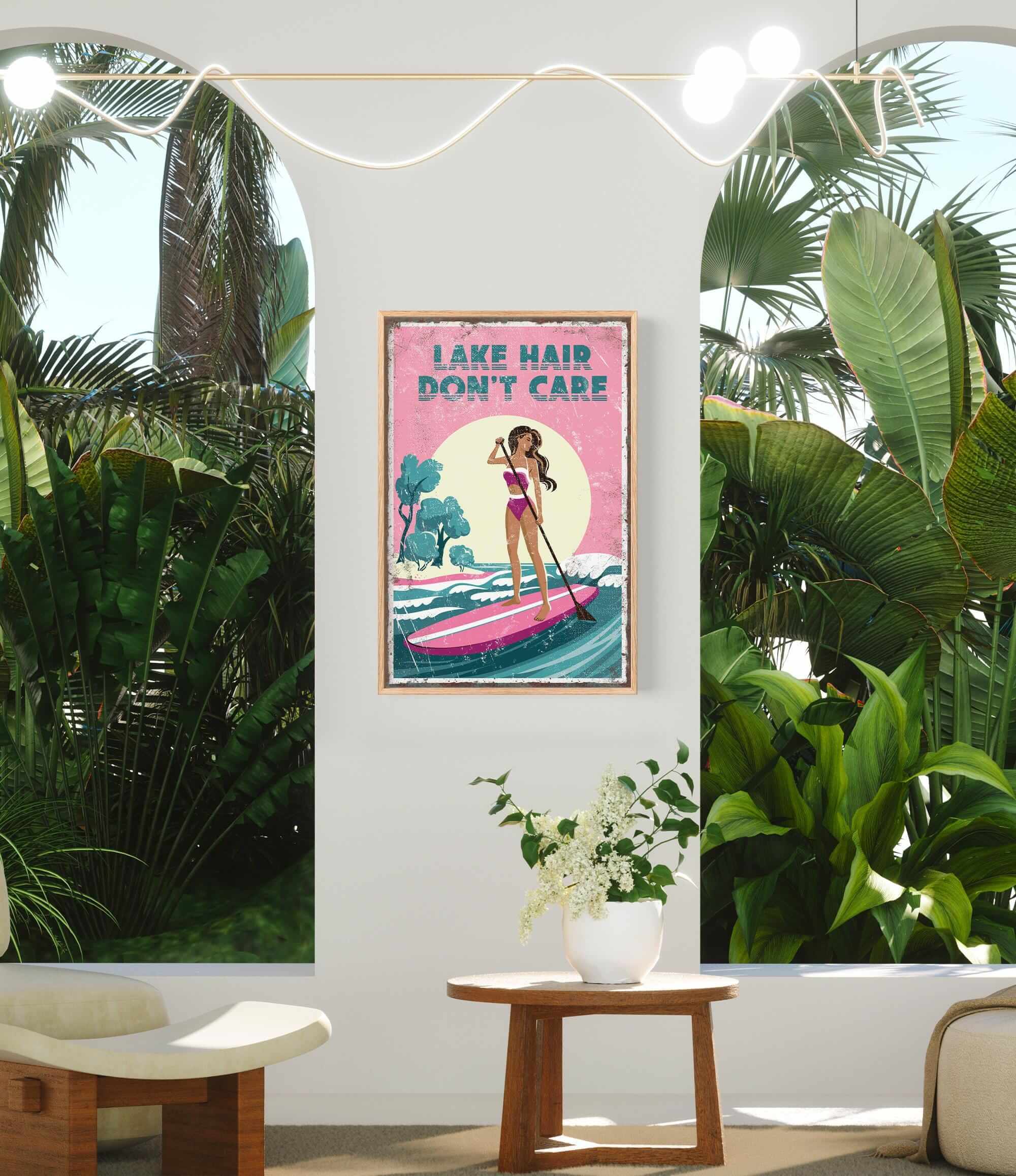 a poster with a woman paddleboarding on a lake, surrounded by tropical plants, with the text "LAKESHAIR DON'T CARE" displayed prominently.