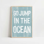 a blue and white print with the words go jump in the ocean