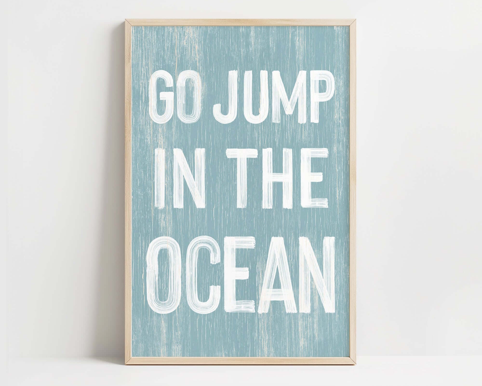 a blue and white print with the words go jump in the ocean