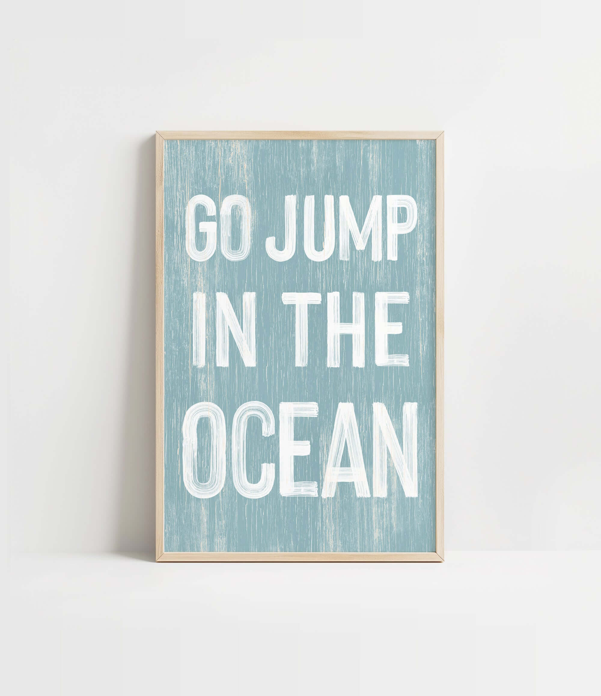 a blue and white print with the words go jump in the ocean