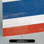 a close up of a piece of wood with the colors of the flag of the