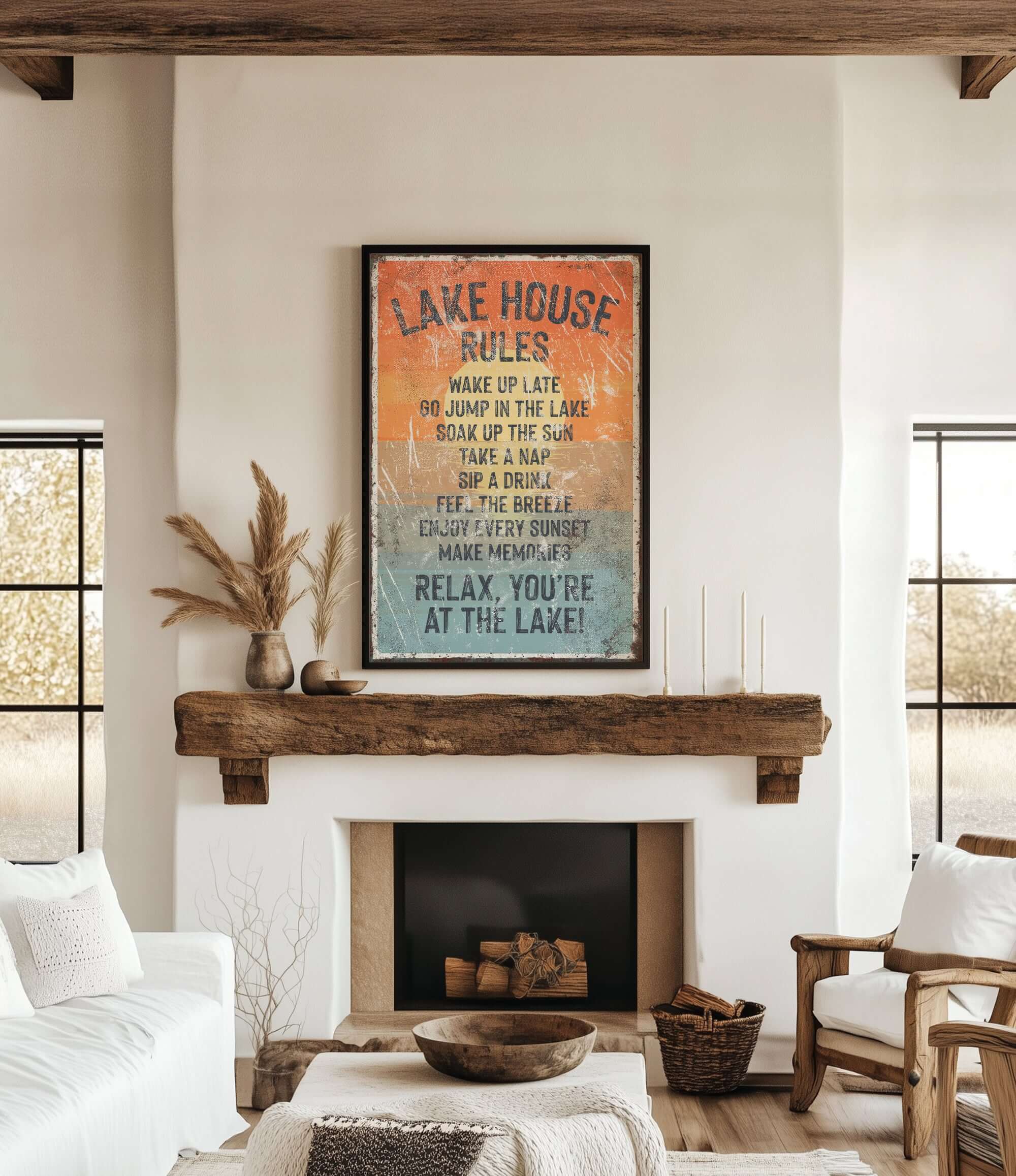 a cozy living room with a fireplace, a wooden mantel, and a framed sign that reads "LAKESHORE RULES" hanging above it.