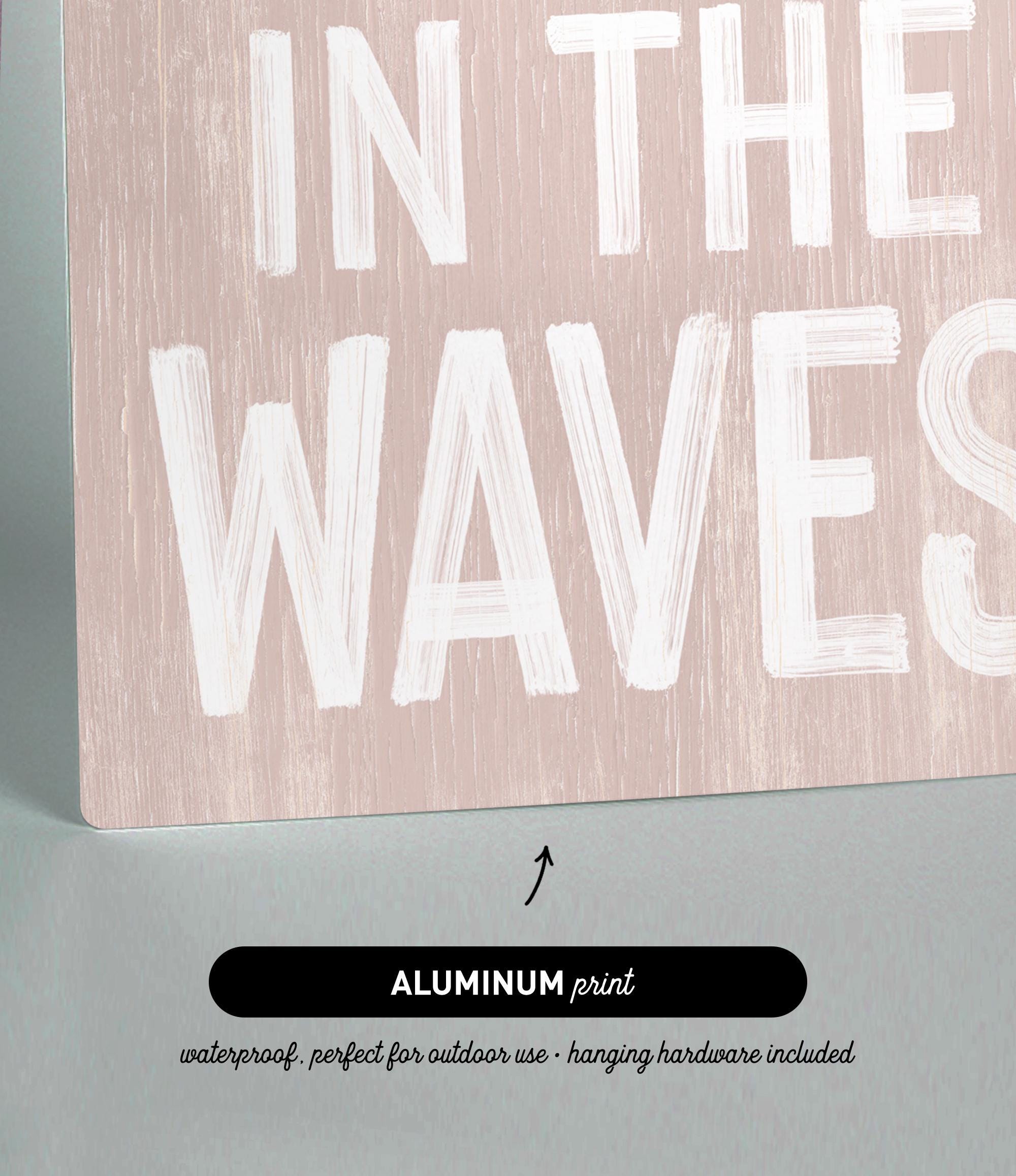 a sign that says in the waves on it