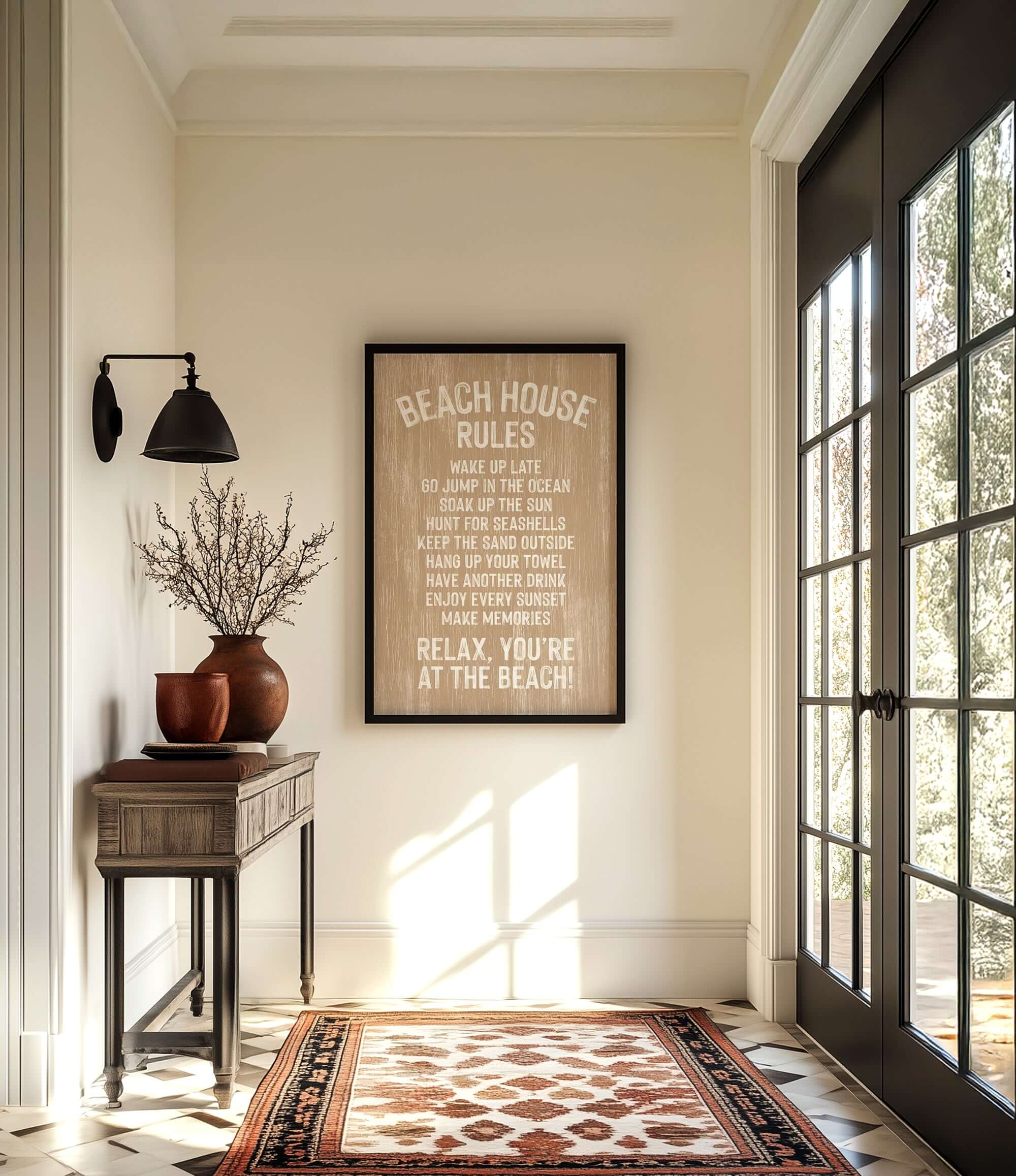 a beach house with a framed sign that reads "BEACH HOUSE RULES" hanging on the wall. The room has a wooden table, a vase with flowers, and a rug on the floor. There is also a large window that allows natural light to enter the space.