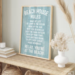 The Beach House Rules Sign in painted wood, Tide, features relaxing rules and makes charming beach house wall decor when displayed with coastal accents.