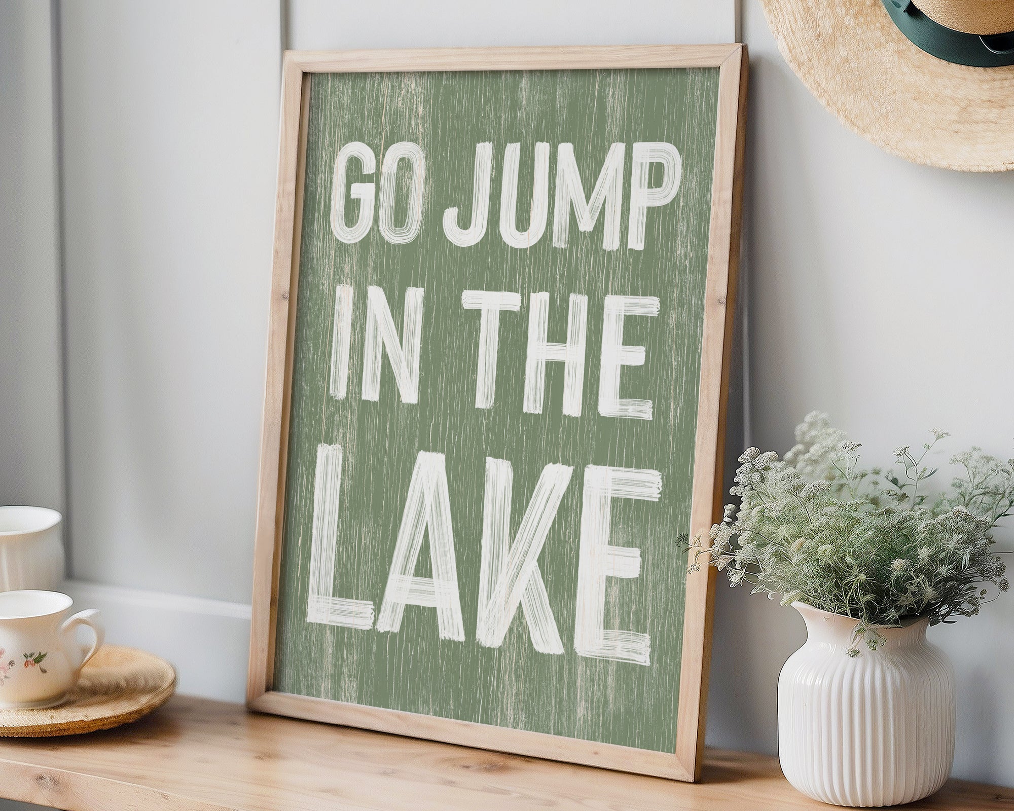 a sign that says go jump in the lake