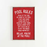 a red poster hanging on a white wall