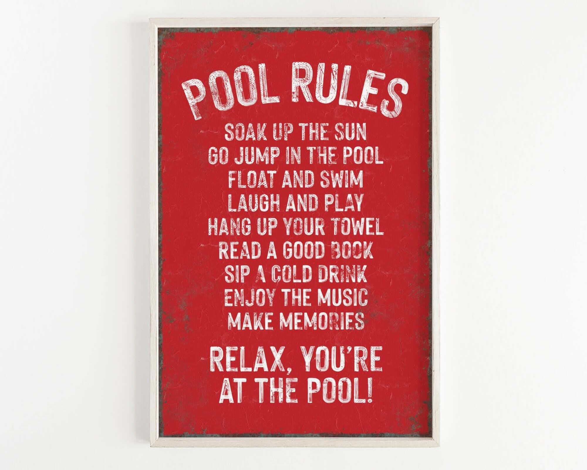 a red poster hanging on a white wall