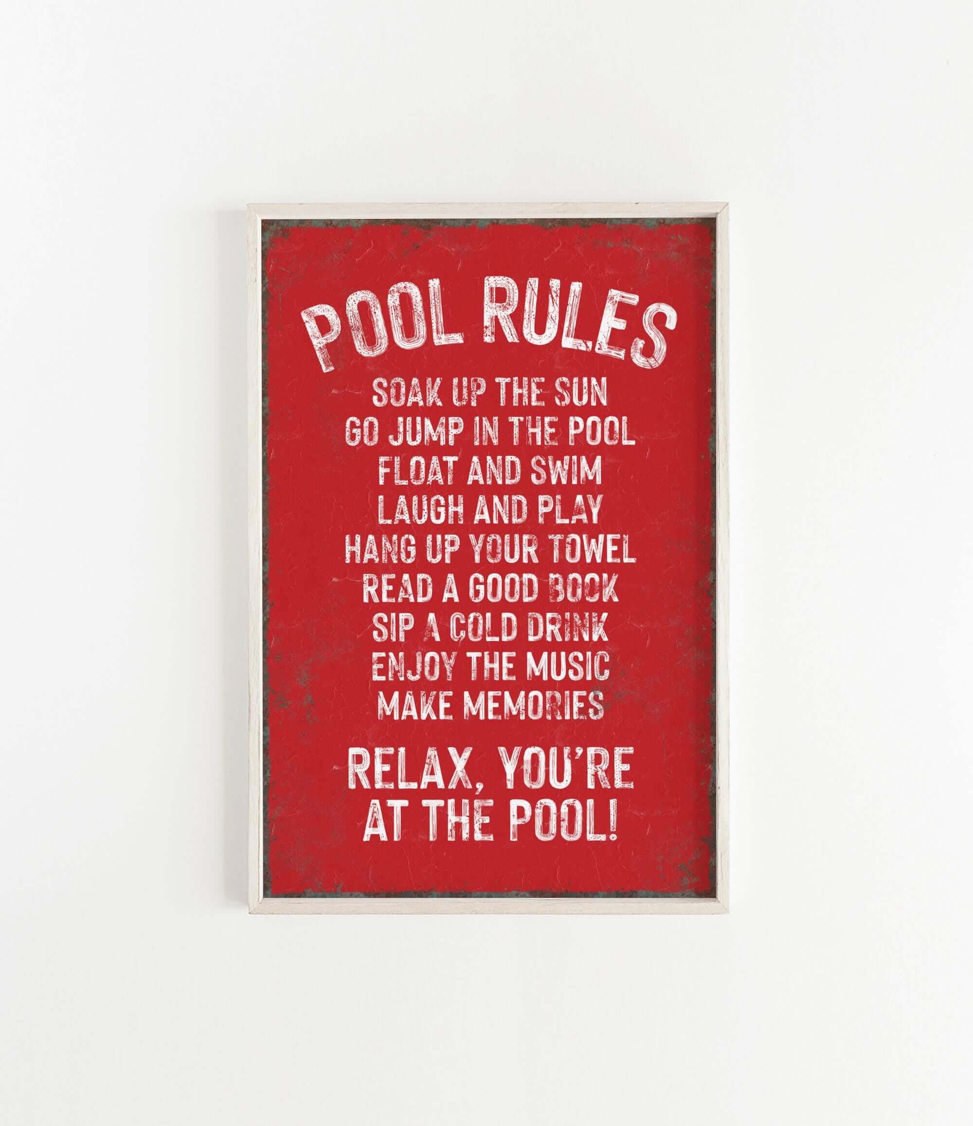a red poster hanging on a white wall