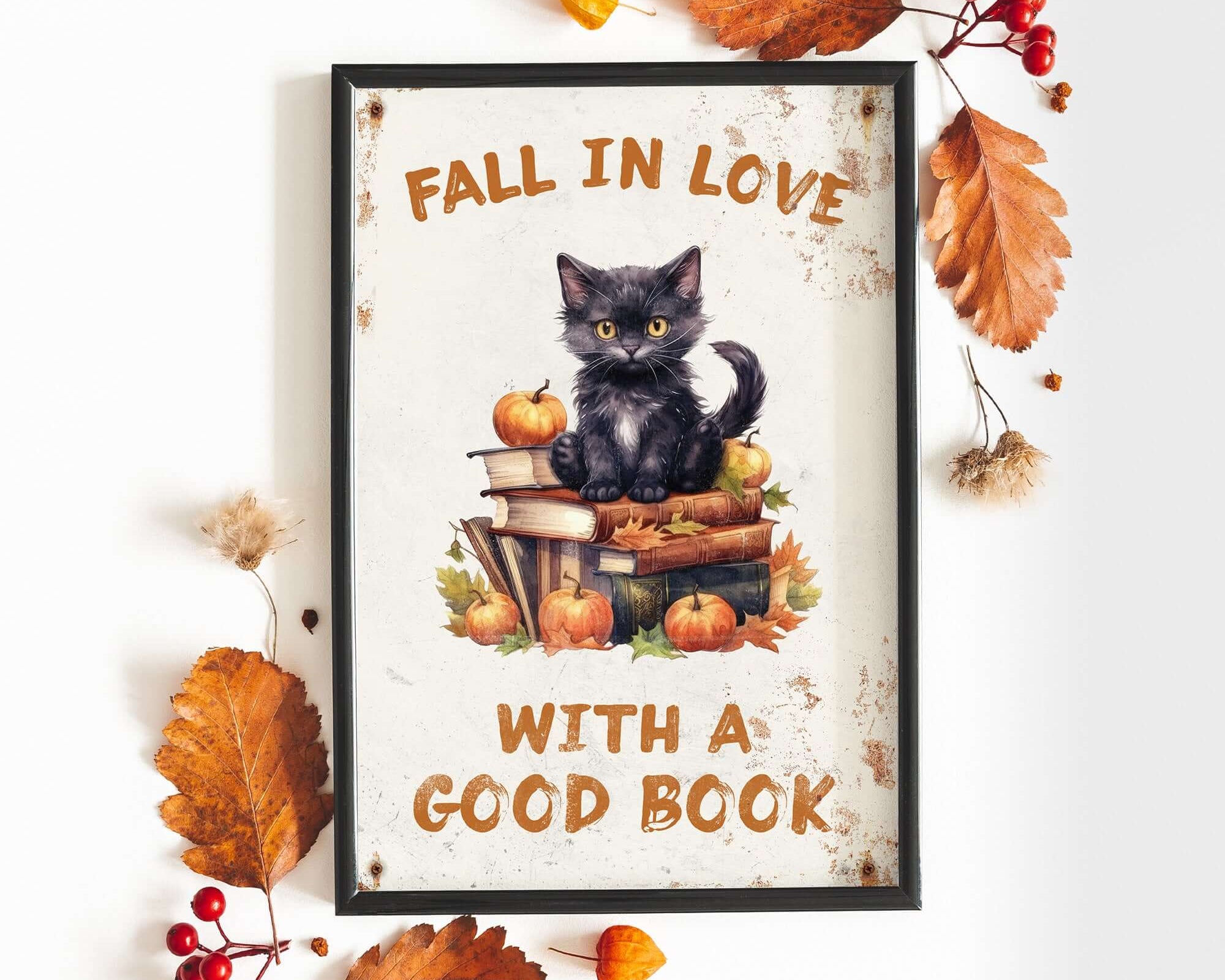 a black cat sitting on top of a pile of books