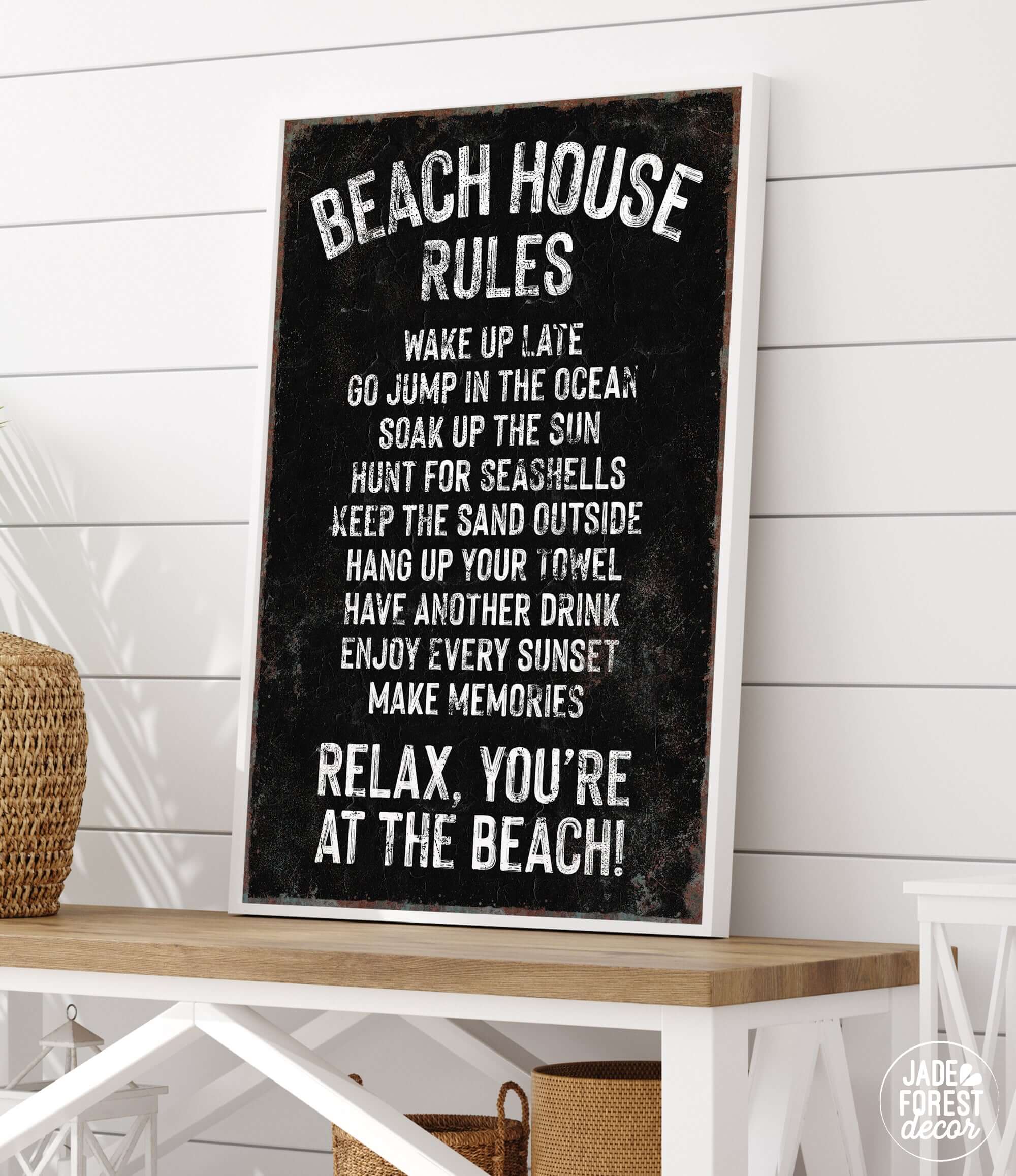 a black and white sign that says beach house rules