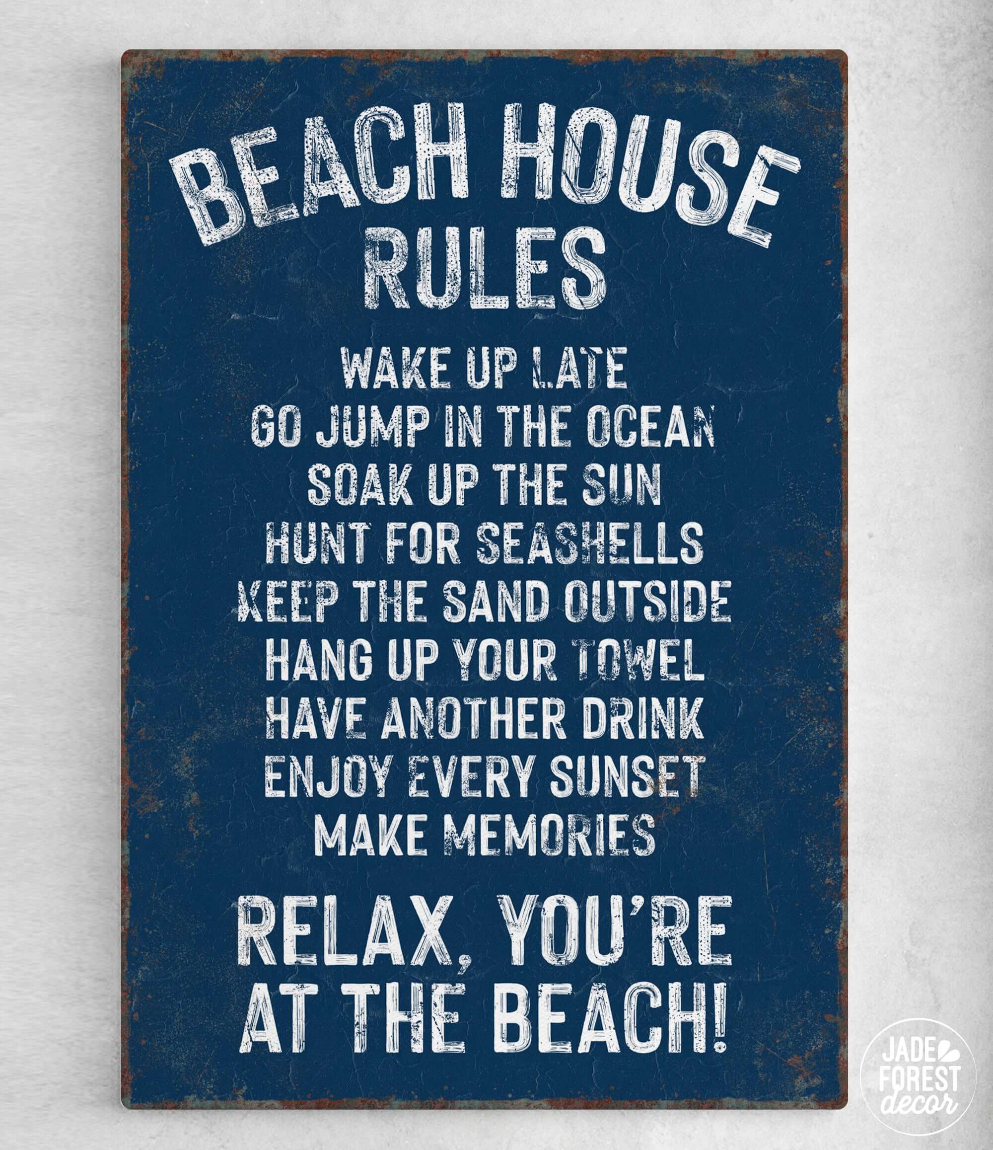 a blue sign that says beach house rules