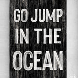 a sign that says go jump in the ocean