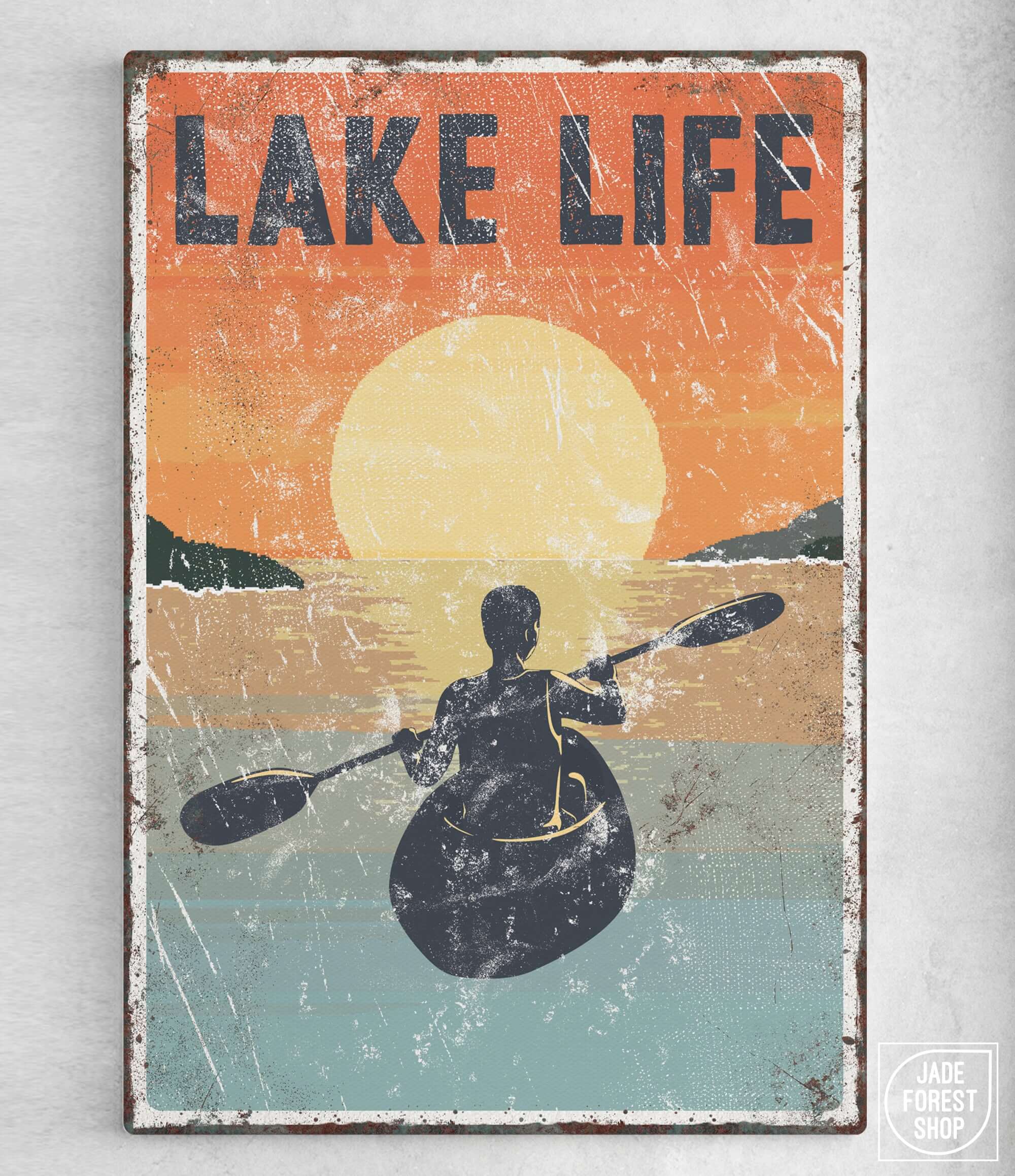 a poster of a man in a kayak on a lake