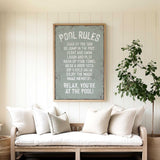 a living room with a couch and a potted plant