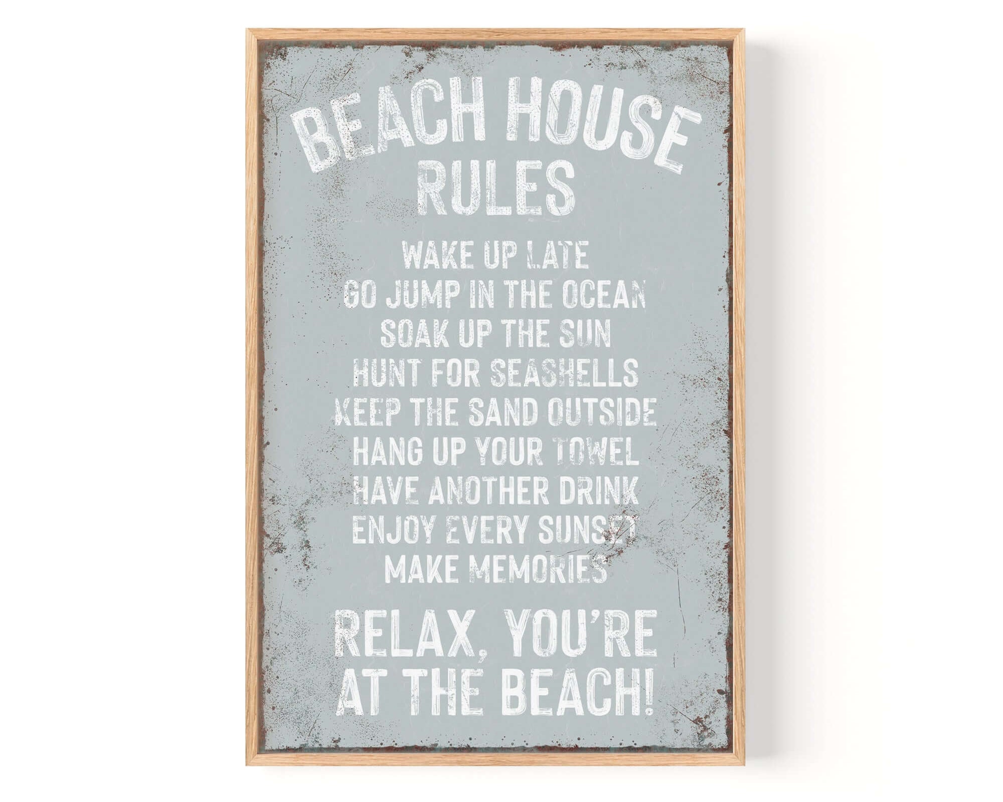 Beach House Rules Sign, Rusted Edge, Smoke—white text on blue details relaxing beach activities. This vintage-inspired wall decor is ideal for a modern farmhouse or coastal home.
