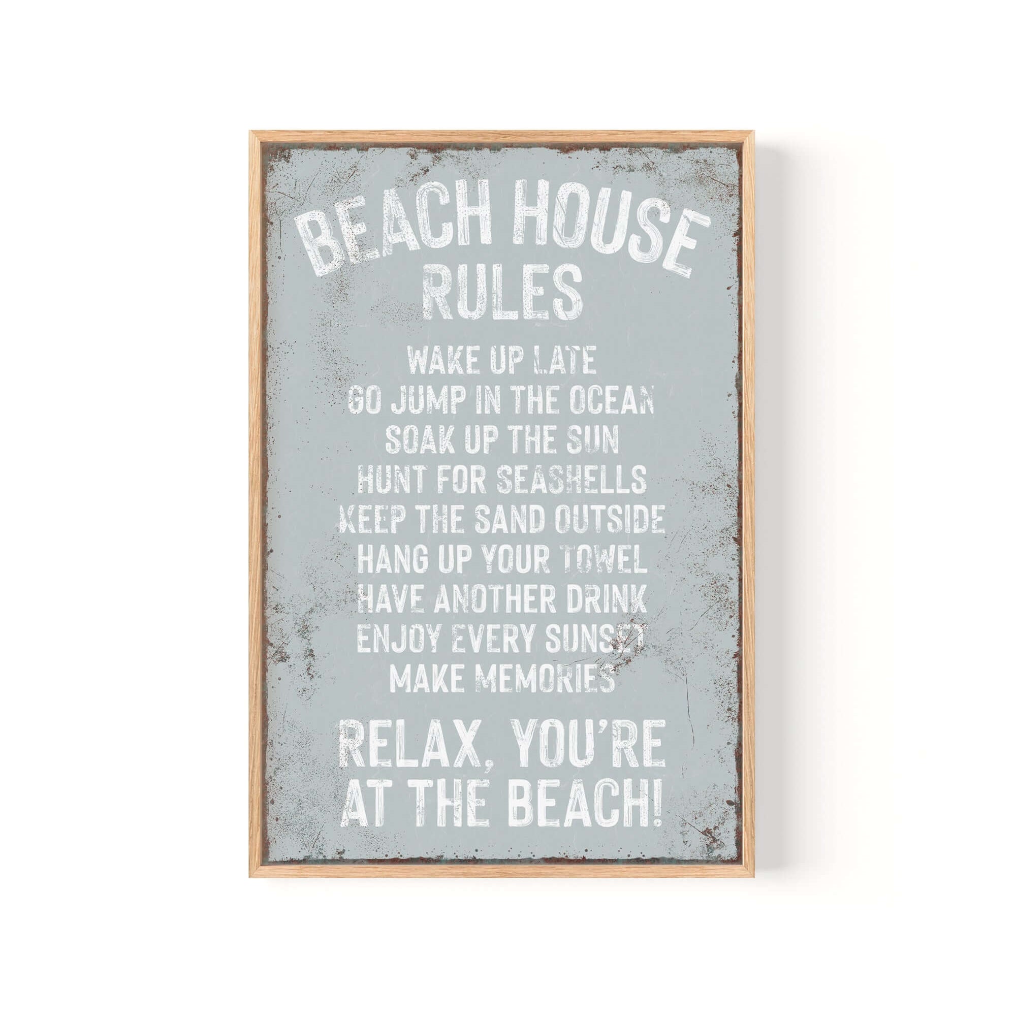 Beach House Rules Sign, Rusted Edge, Smoke—white text on blue details relaxing beach activities. This vintage-inspired wall decor is ideal for a modern farmhouse or coastal home.