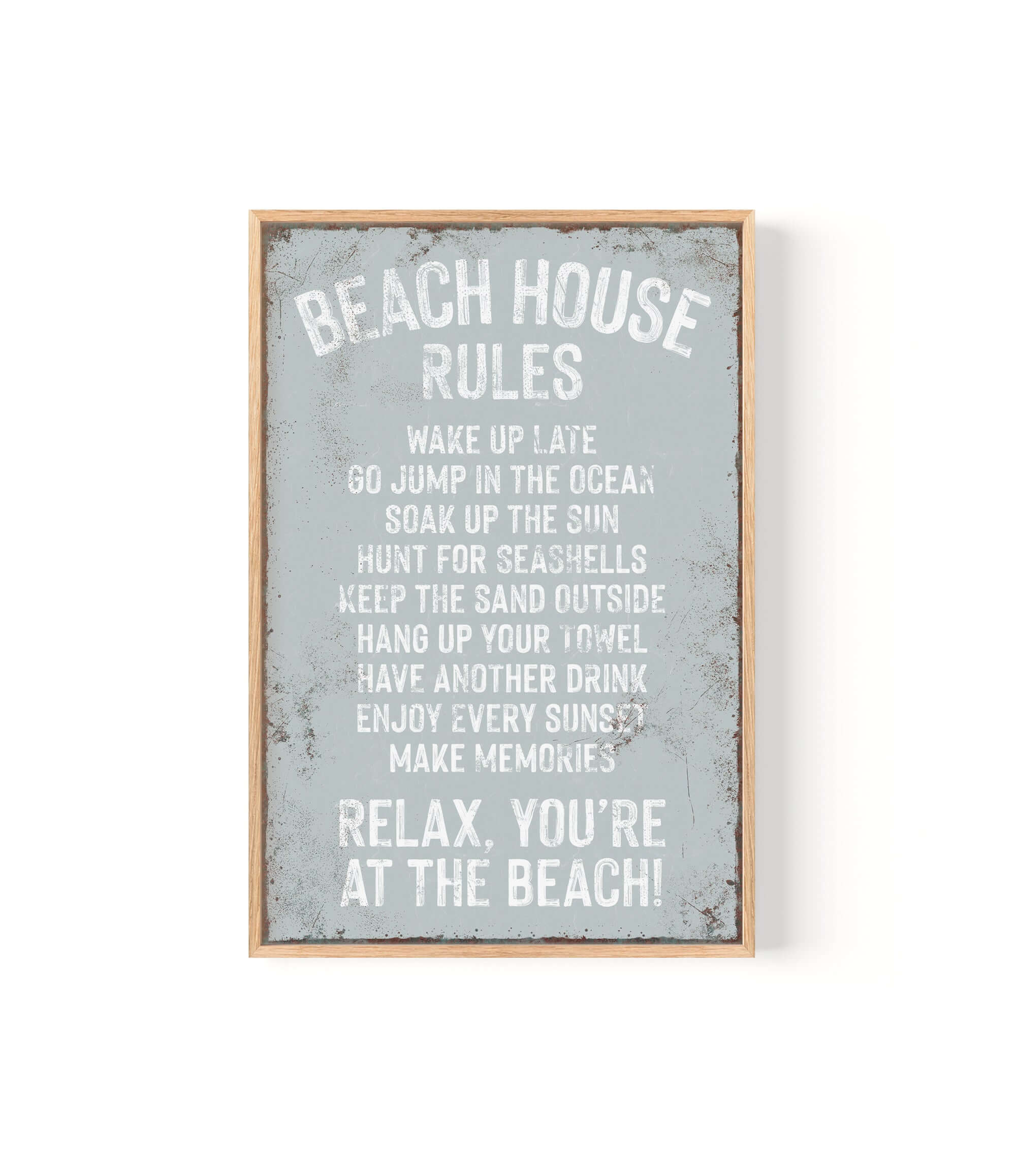 a framed sign that says beach house rules