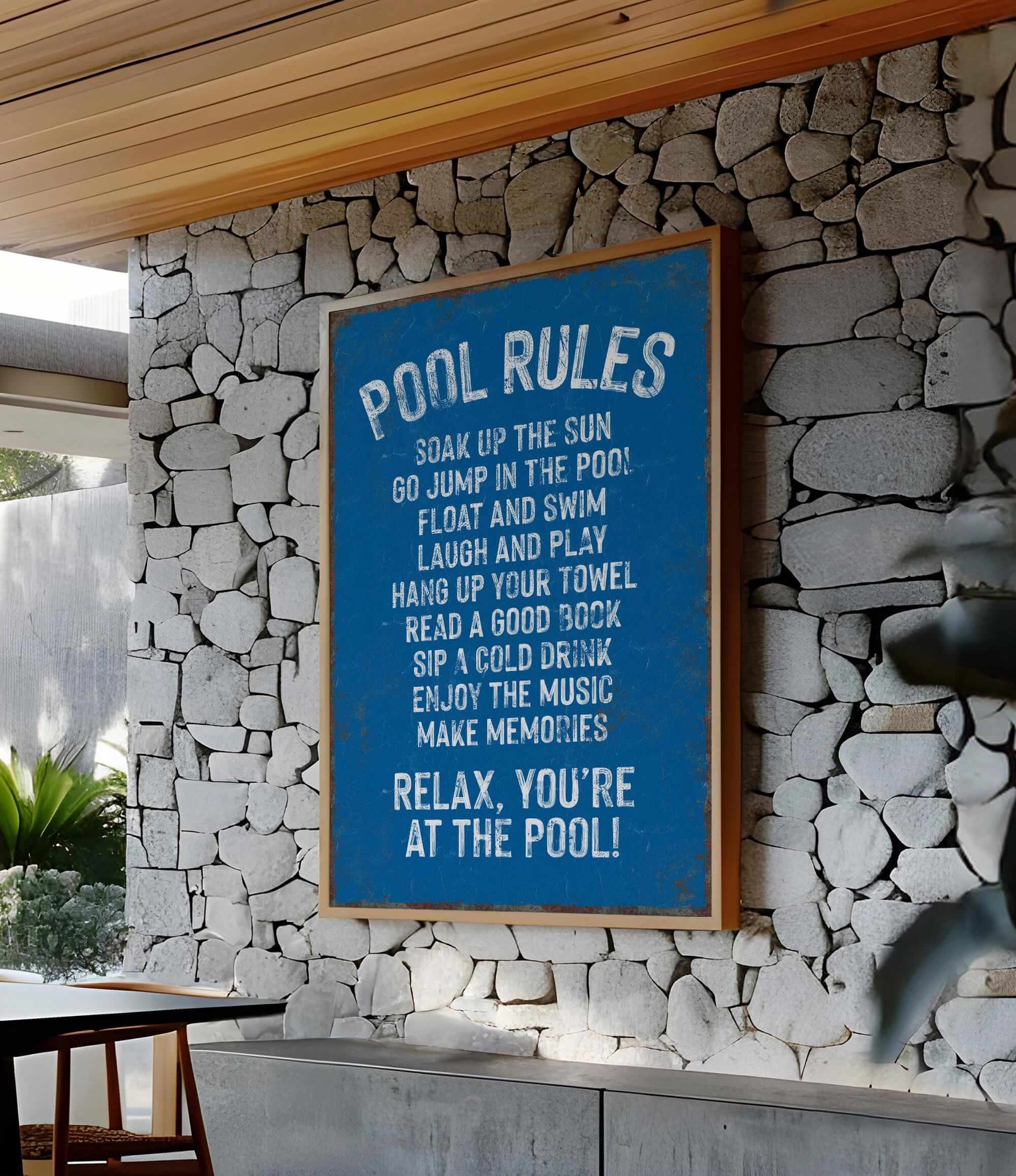 a pool rules sign on a stone wall
