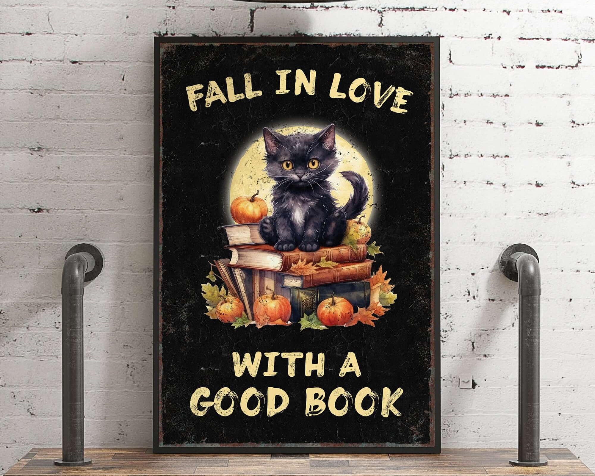 a black cat sitting on top of a wooden shelf
